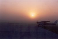 N33DP @ I75 - N33DP silhouetted against a rising sun on a foggy Saturday morning - by Floyd Taber