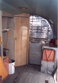 VH-ANR @ CUD - Queensland Air Museum. Galley and toilet of VH-ANR , DC-3 , cn 1944 , Airlines of N.S.W. - by Henk Geerlings