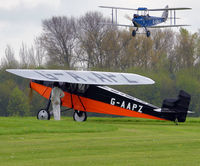 G-AAPZ @ OLD WARDEN - The Desoutter with assisting volunteer awaiting the arrival of the DH60 Moth following it's display - by glider