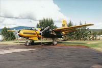 C-GWLT @ YXY - Photograph by Edwin van Opstal with permission. Scanned from a color print. Taken at Whitehose, Yukon, Canada.