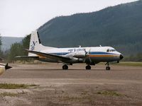 C-FYDU @ YDA - Photograph by Edwin van Opstal with permission. Scanned from a color print. Taken at Dawson City, Yukon, Canada.