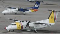 C-GPAB @ TNCM - side by side goes the dash 8's - by SHEEP GANG