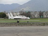 N718JT @ POC - Taxiing on taxiway Sierra towards runway 26L - by Helicopterfriend