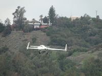 N718JT @ POC - Climbing out westbound - by Helicopterfriend