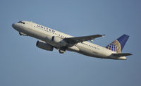 N458UA @ KLAX - Departing LAX on 25R - by Todd Royer