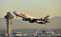 N577FE @ KLAX - Departing LAX on 25R - by Todd Royer