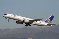 N529UA @ LAX - Continental-schemed United B.757 with a Hollywood backdrop - by Duncan Kirk