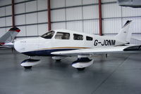 G-JONM @ EGNE - Privately owned - by Chris Hall