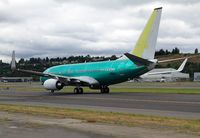 N5573L @ KBFI - Newly minted Boeing 737-800, taxiing to the hanger at Boeing Field (KBFI) after a test flight 0n 24 June 2010. - by Thomas P. McManus