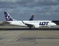 SP-LDE @ LFPG - The aircraft has been displaying the new livery since November 2011. - by Alain Durand