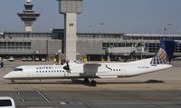 N338NG @ KIAD - DHC-8-402 - by Mark Pasqualino