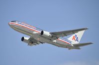 N328AA @ KLAX - Departing LAX on 25R - by Todd Royer