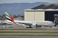A6-EWH @ KLAX - Taxing to Gate - by Todd Royer