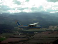 N1826Q @ KMMV - Photo of N1826Q in flight near KMMV in Oregon (Home of the Spruce Goose) - by Ken Scofield