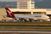 VH-OEH @ LAX - Qantas VH-OEH (FLT QFA15) taxiing to Gate 86 after arrival on the north complex from Brisbane (YBBN/BNE) in the early morning. - by Dean Heald