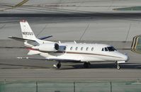 N693QS @ KLAX - Taxiing to parking - by Todd Royer