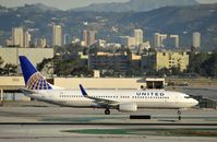 N76528 @ KLAX - taxiing to gate - by Todd Royer