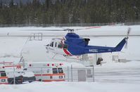 N412BG @ CYXY - Landing for fuel at Whitehorse while en route to a job in Alaska. - by Murray Lundberg