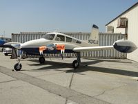 N310JS @ CNO - Parked in a corner with FOR SALE ribbons on her propellers - by Helicopterfriend