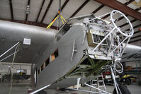 N414H @ 40G - Working on the engine craddles replacments, the aircraft is due to fly in 2012 - by olivier Cortot