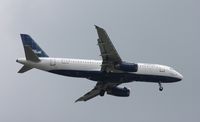 N663JB @ MCO - Paint the Town Blue - by Florida Metal