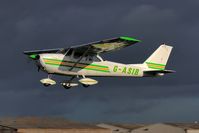 G-ASIB @ BREIGHTON - Highlighted against a threatening sky - by glider