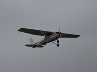 N714HH @ SZP - 1977 Cessna 150M, Continental O-200 100 Hp, takeoff climb Rwy 22, murky skies - by Doug Robertson