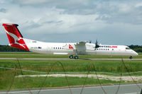 VH-QOM @ YBBN - At Brisbane - by Micha Lueck