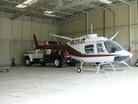 N525JT @ SEE - No rotors, just sitting in the hanger and waiting - by Helicopterfriend