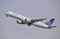 N557UA @ KLAX - Departing LAX on 25R - by Todd Royer