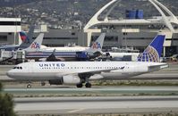 N456UA @ KLAX - Taxiing to gate at LAX - by Todd Royer