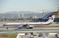 B-6050 @ KLAX - Taxiing to gate at LAX - by Todd Royer