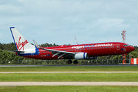 VH-VUK @ YBBN - At Brisbane - by Micha Lueck