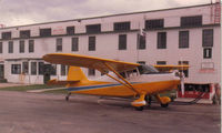 CF-MOA @ CYQF - Spring 1980, Red Deer Alberta. After fuselage recovering, rejuvenated wings, new paint scheme and minor restoration. Only about 1900 hours on it. Original 165 heavy case Franklin overhauled a couple of years before purchase but still '0' time.