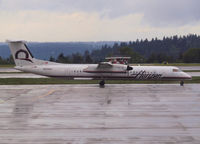 N409QX @ SEA - Taxi to the runway of Seattle Airport - by Willem Göebel