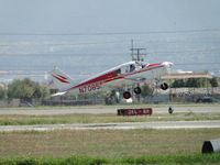 N7085R @ CNO - Appears to be leaping into the air - by Helicopterfriend
