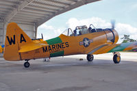 N452WA @ ISM - 1945 North American SNJ-6, c/n: 112034 outside Kissimmee Air Museum