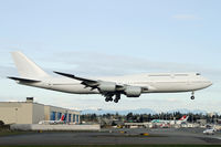 A6-PFA @ PAE - Typical. A bank of cloud ruins this test flight landing shot! - by Duncan Kirk