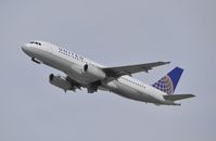 N456UA @ KLAX - Departing LAX on 25R - by Todd Royer
