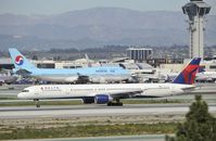 N596NW @ KLAX - Taxiing to Gate at LAX - by Todd Royer