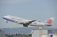 B-18208 @ KLAX - Departing LAX on 25R - by Todd Royer