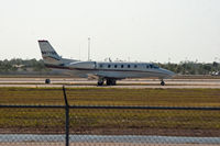 N677QS @ RSW - Cessna 560 taxing for take off - by Mauricio Morro