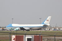 82-8000 @ KCID - Taxiing for departure.  Seen from 1/2 mile SE