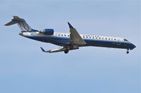 N167GJ @ KORD - GoJet Airlines/United Express Bombardier CL-600-2C10, GJS3658 arriving from Nashville Intl./KBNA, RWY 10 approach KORD. - by Mark Kalfas