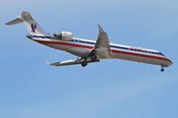 N506AE @ KORD - American Eagle Bombardier CL-600-2C10, EGF3716 arriving from KATL, RWY 10 approach KORD. - by Mark Kalfas