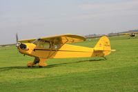 N42248 @ EHTX - This Piper Cub has modified (shorter) wings. It just arrived at the 3rd Light Aircraft Fly-in on Texel Airport in 2011 - by lkuipers