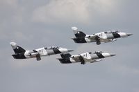 N135EM @ LAL - 3 members of the Black Diamond Jet Team taking off - by Florida Metal