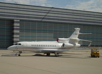 C-GMGX @ LOWW - Magna International Falcon 7X - by Thomas Ranner