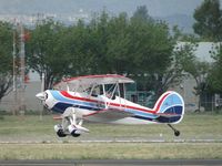 N3617L @ POC - Preparing to touch down on a touch & go from runway 26R - by Helicopterfriend