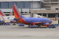 N720WN @ KPHX - Southwest Airlines Boeing 737-7H4 at gate C9, Terminal 4 Phoenix Sky Harbor. - by Mark Kalfas